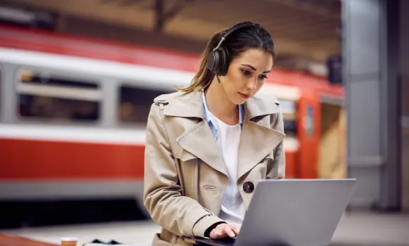 Wireless headphones with active noise cancellation for use in a workplace environment