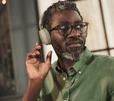 Noise-cancelling headphones with a microphone for business calls
